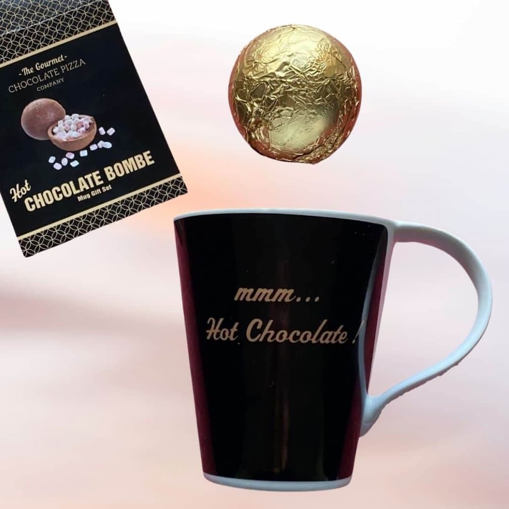 Our Hot Chocolate Bombe & Mug Gift Set includes a Hot Chocolate Bombe wrapped in gold foil and stylish mug.